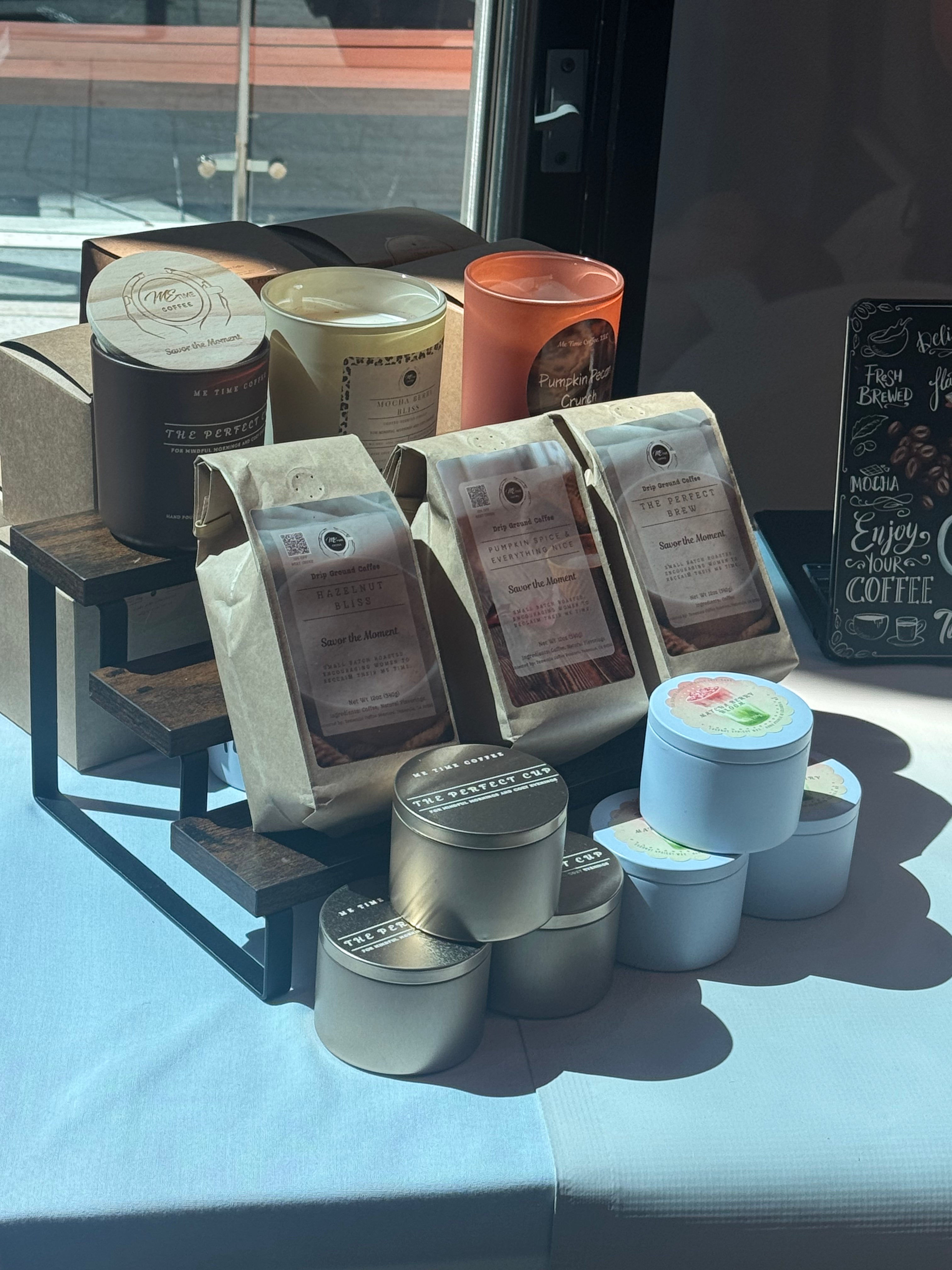specialty coffee products including bags, and mood boosting candles